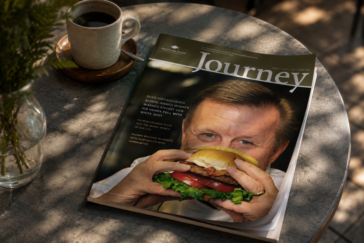 Journey Magazine on a café table